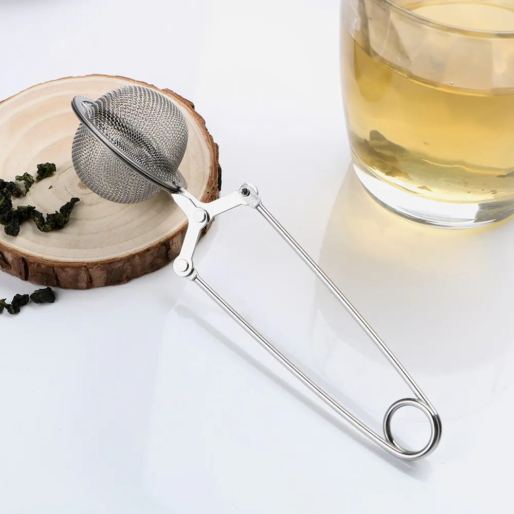 We Heal Hearts Presents ( Tea Infuser Stainless Steel Sphere Mesh Tea Strainer )