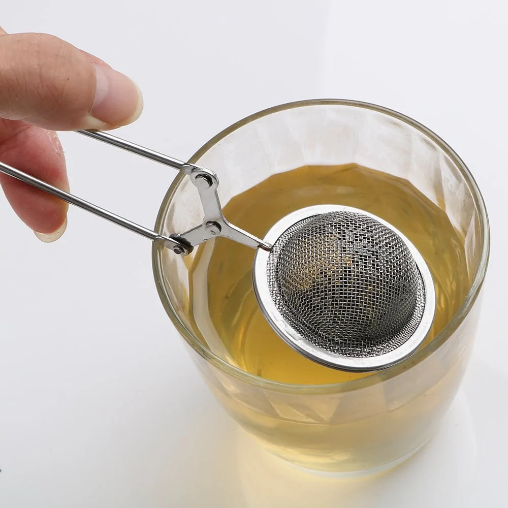 We Heal Hearts Presents ( Tea Infuser Stainless Steel Sphere Mesh Tea Strainer )